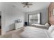 Comfortable bedroom with ample natural light, two beds and a ceiling fan at 418 Marcello Blvd, Kissimmee, FL 34746
