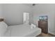 This bedroom is furnished with a comfortable bed and TV at 418 Marcello Blvd, Kissimmee, FL 34746