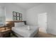 This bedroom features stylish decor and a cozy queen bed at 418 Marcello Blvd, Kissimmee, FL 34746