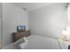 This bedroom offers a comfortable bed and TV for relaxation at 418 Marcello Blvd, Kissimmee, FL 34746