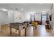 Inviting game room with foosball table and cozy living area, ideal for leisure and entertainment at 418 Marcello Blvd, Kissimmee, FL 34746