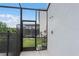 Enjoy the convenience of an outdoor shower with stylish fixtures, adjacent to the screened-in pool area, enhancing the home's luxurious feel at 418 Marcello Blvd, Kissimmee, FL 34746