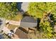 Top-down aerial view highlighting a well-maintained home with a driveway, manicured lawn, and proximity to neighboring houses at 4424 Park Eden Cir, Orlando, FL 32810
