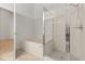 Bathroom with a walk-in shower and a large soaking tub at 4424 Park Eden Cir, Orlando, FL 32810