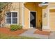 Inviting front entrance with neat landscaping at 4424 Park Eden Cir, Orlando, FL 32810