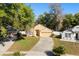 Charming single-story home with well-maintained landscaping and a spacious driveway at 4424 Park Eden Cir, Orlando, FL 32810
