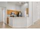 Well-equipped kitchen with stainless steel appliances and breakfast bar at 4424 Park Eden Cir, Orlando, FL 32810