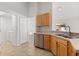 Bright kitchen featuring a stainless steel dishwasher and a double sink at 4424 Park Eden Cir, Orlando, FL 32810