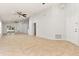 Expansive living room featuring neutral tile flooring, and access to the kitchen and lanai at 4424 Park Eden Cir, Orlando, FL 32810