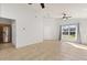 Spacious living room with tile flooring, abundant natural light, and a view of the front yard at 4424 Park Eden Cir, Orlando, FL 32810