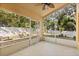 Relaxing screened porch with views of the landscaped backyard at 4424 Park Eden Cir, Orlando, FL 32810