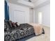 Well-lit bedroom featuring a comfortable bed, double door closet and neutral carpet at 4561 Cabello Loop, Kissimmee, FL 34746