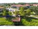 Scenic view of a community featuring walking paths, mature trees, and well-manicured landscaping creating a serene outdoor space at 4561 Cabello Loop, Kissimmee, FL 34746