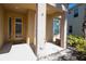 Inviting front porch with decorative bench offers a warm welcome at 4561 Cabello Loop, Kissimmee, FL 34746
