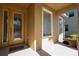 Inviting front porch with decorative bench offers a warm welcome at 4561 Cabello Loop, Kissimmee, FL 34746
