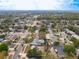 A neighborhood aerial view, showing the community's layout and proximity to green spaces at 4905 Tam Dr, Orlando, FL 32808