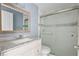 Updated bathroom featuring glass-door shower, modern vanity and sink at 4907 Silver Oaks Vlg # D, Orlando, FL 32808
