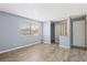 Empty bedroom with vinyl floors and one window at 4907 Silver Oaks Vlg # D, Orlando, FL 32808