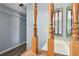 Staircase with wooden banister and view of hallway at 4907 Silver Oaks Vlg # D, Orlando, FL 32808