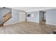 Spacious living room with staircase, modern floors, and ample closet space at 4907 Silver Oaks Vlg # D, Orlando, FL 32808