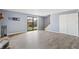 Inviting living room with fireplace, sliding doors to yard, and convenient closet at 4907 Silver Oaks Vlg # D, Orlando, FL 32808