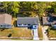 Aerial view of a well-maintained home showcasing its location within a quiet neighborhood at 5603 Marie Ct, Orlando, FL 32818