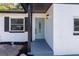 Close-up of the front door, highlighting its stylish design and welcoming entrance at 5603 Marie Ct, Orlando, FL 32818