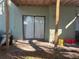 View of the back patio with sliding glass doors, ceiling and air conditioner at 5855 La Costa Dr # S, Orlando, FL 32807