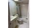 Bathroom featuring toilet, tub with shower, tiled flooring and single sink vanity at 5855 La Costa Dr # S, Orlando, FL 32807