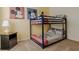 bedroom with bunk beds and mickey mouse themed decorations at 6049 Broad Oak Dr, Davenport, FL 33837