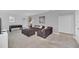 Large game room with sectional sofa, foosball table, ottoman, and a wall-mounted TV at 6049 Broad Oak Dr, Davenport, FL 33837