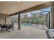 Screened patio features outdoor seating, a pool, spa and a safety fence at 6049 Broad Oak Dr, Davenport, FL 33837