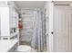 Updated bathroom featuring a shower, modern fixtures, and a neutral color palette at 698 Seabrook Ct # 103, Altamonte Springs, FL 32714