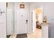 Home entryway featuring a white front door, tile flooring, and an open view to the living area at 698 Seabrook Ct # 103, Altamonte Springs, FL 32714