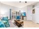 Comfortable living room with tile flooring, modern furniture, and natural light from sliding glass door at 698 Seabrook Ct # 103, Altamonte Springs, FL 32714
