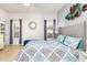 Beautifully decorated main bedroom featuring a comfortable bed, natural light, and tile flooring at 698 Seabrook Ct # 103, Altamonte Springs, FL 32714