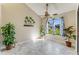 Dining area featuring tile flooring, neutral walls, decor, and a bright window at 704 Sky Tree Ct, New Smyrna Beach, FL 32168