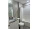 Clean bathroom with a shower-tub combo, granite countertop vanity, and modern fixtures at 8008 Formosa Valley Pl, Kissimmee, FL 34747