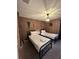 Unique Harry Potter themed bedroom featuring two cozy twin beds and distinctive brick wallpaper at 8008 Formosa Valley Pl, Kissimmee, FL 34747