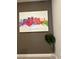 Stylish room with an 'Orlando' painting and a lush green plant adding a touch of color at 8008 Formosa Valley Pl, Kissimmee, FL 34747