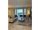 Bright living room with sliding glass doors to outdoor space, comfortable seating, and modern décor at 8008 Formosa Valley Pl, Kissimmee, FL 34747