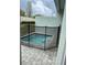 Private plunge pool is fenced and surrounded by an attractive brick patio at 8008 Formosa Valley Pl, Kissimmee, FL 34747