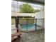 Cozy pool area surrounded by pavers and a safety fence, perfect for relaxing outdoors at 8008 Formosa Valley Pl, Kissimmee, FL 34747