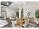 Open concept dining area with hardwood floors and open concept to the living room at 801 W 2Nd Ave, Windermere, FL 34786