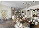 Open floor plan showcasing a seamlessly integrated living room, kitchen, and dining nook with elegant finishes at 801 W 2Nd Ave, Windermere, FL 34786