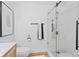 Modern bathroom with a glass shower, sleek fixtures, and a minimalist design for a clean and refreshing space at 8010 Soldierwood St, Winter Garden, FL 34787