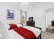 Bedroom featuring two beds, a dresser, and framed art at 8073 Santee Dr, Kissimmee, FL 34747