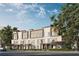 Modern townhomes with neutral exteriors, landscaping, and a sidewalk for pedestrians to enjoy at 1002 E Robinson St # 1, Orlando, FL 32801