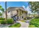 Inviting two-story condo with beautiful landscaping, convenient stair access, and well-maintained surroundings at 1033 S Hiawassee Rd # 2628, Orlando, FL 32835