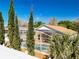 Backyard view featuring landscaping and screened in pool at 1049 Winding Water Way, Clermont, FL 34714